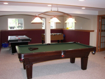 Man cave with pool table, foosball and ice hockey