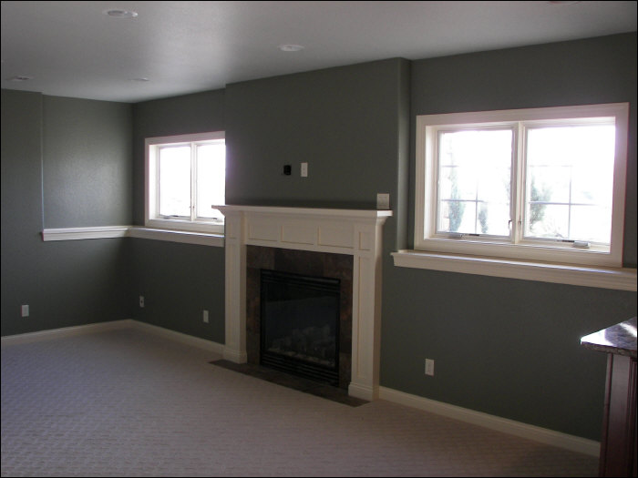 Custom fireplace construction with egress windows