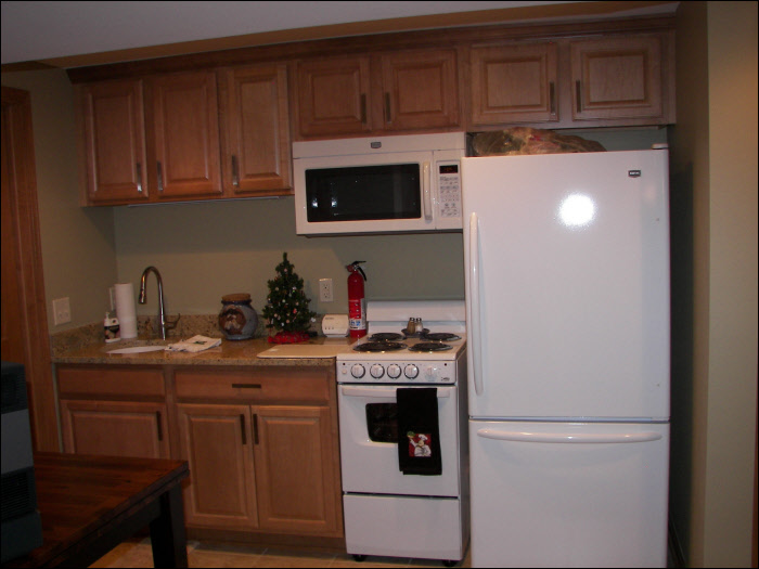 Custom cabinetry in basement kitchen